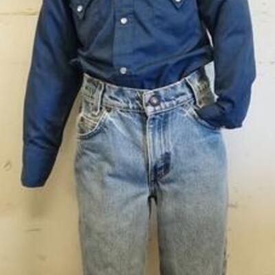 1187	YOUNG MALE MANNEQUIN CLOTHED WITH LEVI JEANS, COBY BOOTS, GA WESTERN HAT AND WESTERN FASHIONS SHIRT. MANNEQUIN HAS NO ARMS, CHIPPING...