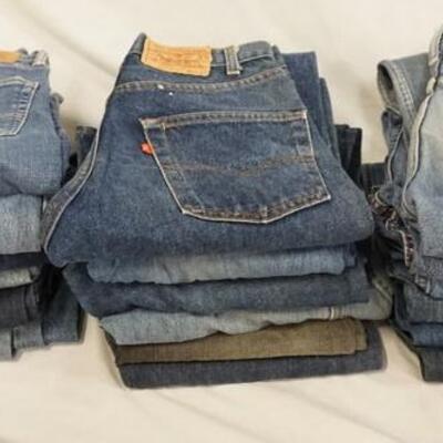 1130	LOT OF 18 PAIRS OF LEVI STRAUSS & COMPANY JEANS. ALL HAVE 29 IN WAIST. VARYING DEGREES OF WEAR 
