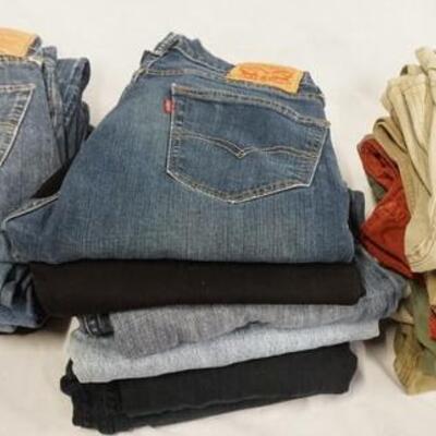 1166	LOT OF 18 PAIRS OF LEVI'S JEANS. W/ 26, 28, 29 & 30 IN WAIST SIZES. VARYING DEGREES OF WEAR 
