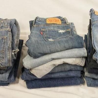1215	LOT OF 18 PAIRS OF LEVIS JEANS W/ 30 IN WAIST SIZES. VARYING DEGREES OF WEAR
