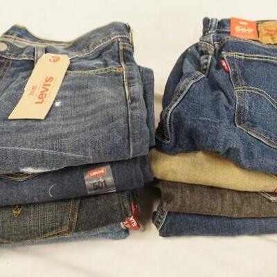 1109	LOT OF NINE PAIRS OF LEVI STRAUSS & COMPANY JEANS. NEW W/ TAGS ALL HAVE 30 IN WAIST 
