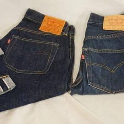 1059	LOT OF TWO PAIRS OF VINTAGE LEVI STRAUSS & COMPANY SELVEDGE JEANS W/ BIG E. ONE PAIR IS 551 ZXX SIX W 27 X L32, THE OTHER IS S501XX...