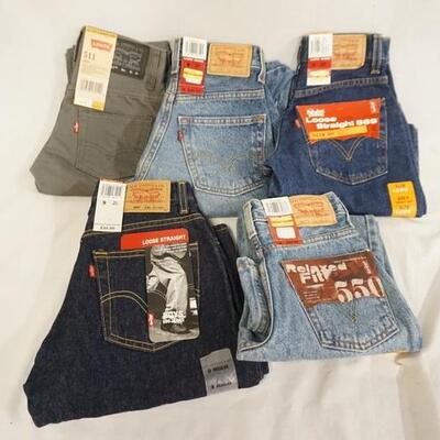 1214	LOT OF FIVE PAIRS OF LEVIS JEANS. NEW W/ TAGS. ALL ARE SIZE 9 
