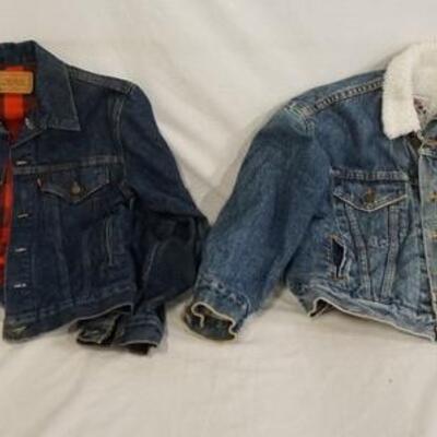 1075	LOT OF TWO USA MADE LEVI STRAUSS & COMPANY LINED DEMIN JACKETS ONE IS SIZE 18 W/ RED TAB THE OTHER IS SIZE S W/ ORANGE TAB
