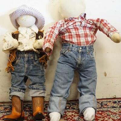 1196	2 STUFFED MANNEQUINS CLOTHED WITH LEVI RED TAB JEANS, 1 WITH GEORGE WESTERN SHIRT, 1 WITH TOY WESTERN BOOTS, FRINGED WESTERN VEST,...