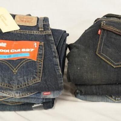 1107	LOT OF NINE PAIRS OF LEVI STRAUSS & COMPANY JEANS. NEW W/ TAGS. ALL HAVE 30 IN WAIST 
