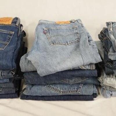 1211	LOT OF 18 PAIRS OF LEVI'S JEANS. W/ 34, 35, 36 & 38 IN WAIST SIZES. VARYING DEGREES OF WEAR 
