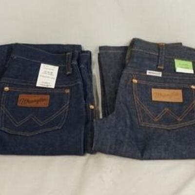 1073	LOT OF FOUR PAIRS OF VINTAGE WANGLER JEANS, TWO STILL HAVE ORIGINAL TAGS. SIZES ARE 27 X 32, 29 X 32, 27 X 32, & 26 X 29 1/2 
