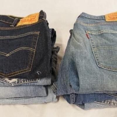 1045	LOT OF EIGHT PAIRS OF MEN'S SIZED LEVI STRAUSS & COMPANY JEANS SIZES RANGE FROM 36-40 W, VARYING DEGREE OF WEAR

