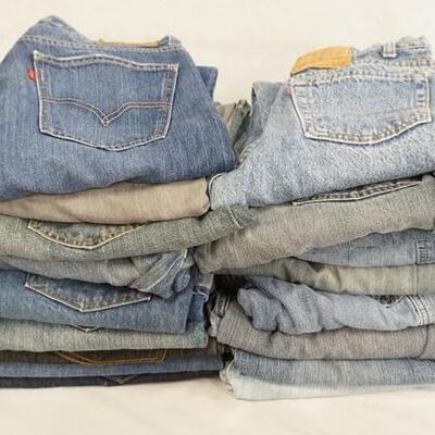 1100	LOT OF 18 PAIRS OF LEVI'S JEANS ALL HAVE 30 IN WAIST. VARYING DEGREES OF WEAR 

