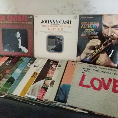 https://ctbids.com/#!/description/share/697722 Mystery lot of vinyl records. Johnny Cash, The Ray Charles Singers and Slim Whitman are...