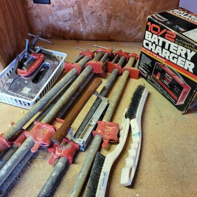 https://ctbids.com/#!/description/share/697749 6 and 12 volt battery charger and various sizes of clamps. The smallest is a 1