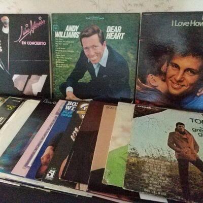 https://ctbids.com/#!/description/share/697720 Mystery lot of vinyl records. Includes Tom Jones, Julio Iglesias, Bobby Vinton and more.

 