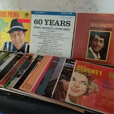 https://ctbids.com/#!/description/share/697721 Mystery lot of vinyl records. Includes Rosemary Clooney, Louis Prima, Dean Martin and...