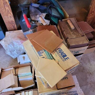https://ctbids.com/#!/description/share/697707 Lots of miscellaneous tile and pavers. Knee pads, and flooring tools are also included!

 
