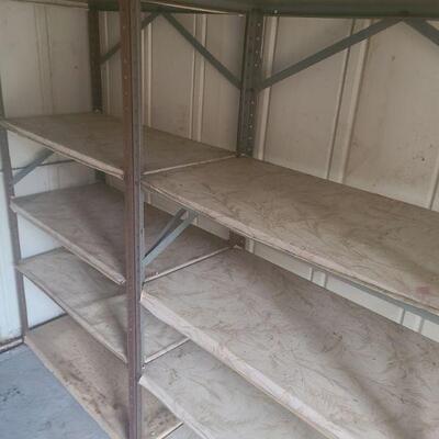 https://ctbids.com/#!/description/share/697732 Shelving is covered in tack paper though that can be removed. Shelving units both measure...