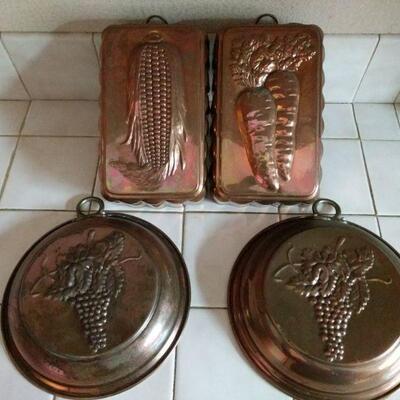 https://ctbids.com/#!/description/share/697671 Set of 4 copper pans. Loaf style pieces measure 8