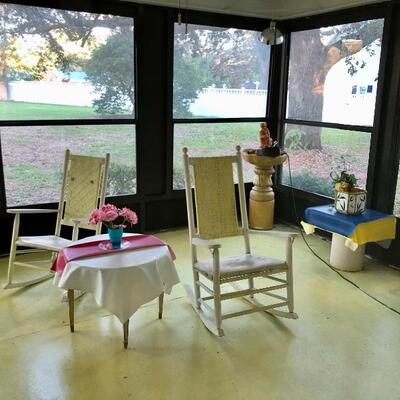 Pair of rocking chairs on the enclosed back porch