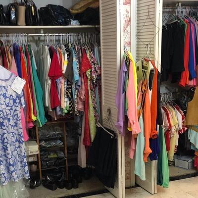 Vintage ladies clothes galore!!! Closets packed full of them...