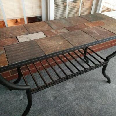 https://ctbids.com/#!/description/share/700675 Rustic Slate Tile Topped Table. Table top is 48