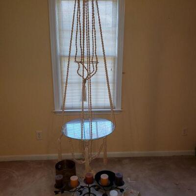 https://ctbids.com/#!/description/share/700567 Beautiful macrame hanging glass table, glass top is 24