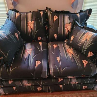 https://ctbids.com/#!/description/share/700616 Blue floral loveseat with pink floral design. Includes 2 toss pillows. Pet free home....