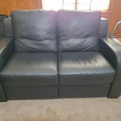 https://ctbids.com/#!/description/share/700592 Beautiful Natuzzi black leather loveseat imported from Italy. 63x37x37
