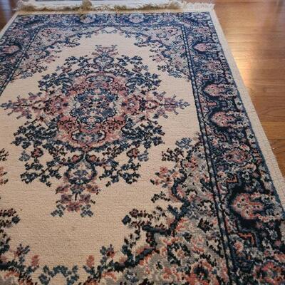 https://ctbids.com/#!/description/share/700644 Only the three rugs, no tables or anything else included. Smallest rug measures 39