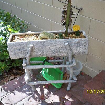 Outdoor Wood and Twig style Planter with plants