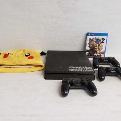 7162 • Play Station 4, 3 Controllers, Dragonball Xenoverse 2, And Pokemon Hat