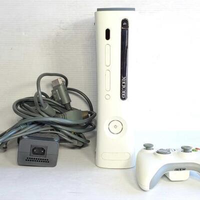 1070	
XBOX 360 with Controller and Power Cord
XBOX 360 with Controller and Power Cord