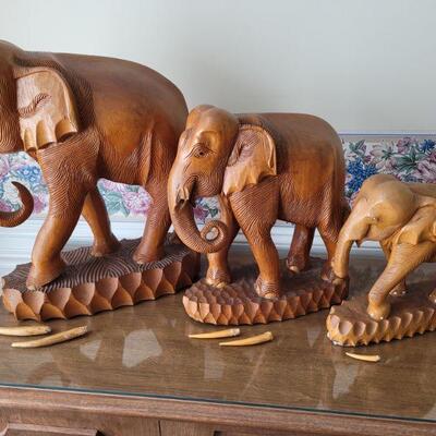 https://ctbids.com/#!/description/share/709603 Beautiful carved wood elephant family. The father is 21