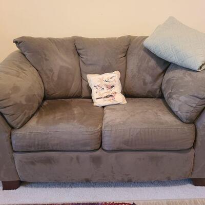 https://ctbids.com/#!/description/share/709621 Taupe microfiber sofa is basically like new. Includes cover that has been used to keep it...