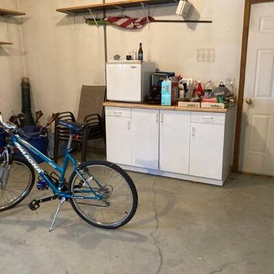 Small fridge, cabinet & bike