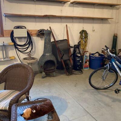 Outdoor fireplace, wheel barrow, etc.