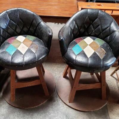 #5104 â€¢ Two Leather Swivel Chairs Made From Whiskey Barrel