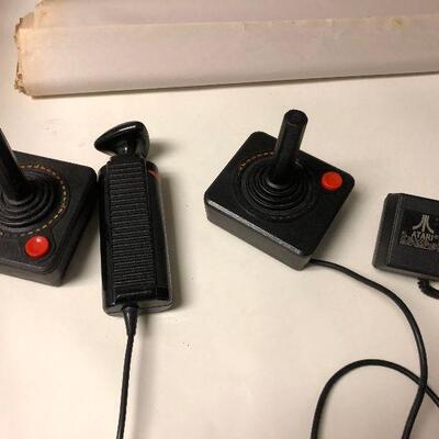 https://www.ebay.com/itm/114648777452	BM4010 Atari 2600 Accessories; 2 Joystick , AC,..  Untested		 Auction 
