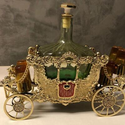 https://www.ebay.com/itm/124551935416	LAR9030 Decanter Music Box Carriage Glass and Metal Pickup Only (Does Play)		 Buy-it-Now 	 $100.00 
