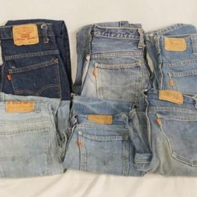 1007	LOT OF TEN PAIRS OF VINTAGE LEVI STRAUSS & COMPANY JEANS W/ ORANGE TABS. LOT INCLUDES A PAIR OF BELL BOTTOMS SIZE; 27 X 30. THE REST...