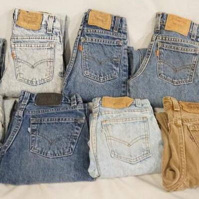 1001	LOT OF NINE PAIRS OF VINTAGE USA MADE YOUTH SIZED LEVI STRAUSS & COMPANY JEANS SIX ARE ORANGE TAB, THE OTHERS ARE WHITE, TAN &...