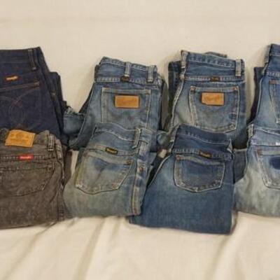 1031	LOT OF TWELVE PAIRS OF VINTAGE WRANGLER JEANS. SEVEN ARE YOUTH SIZE 14, FOUR ARE YOUTH SIZE 12 & ONE PAIR IS YOUTH SIZE 16.VARYING...