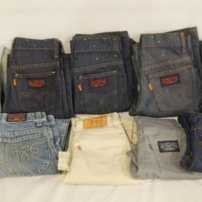 1084	LOT OF 11 PAIRS OF VINTAGE LEVIS JEANS. ALL ARE YOUTH SIZES. VARYING DEGREES OF WEAR 
