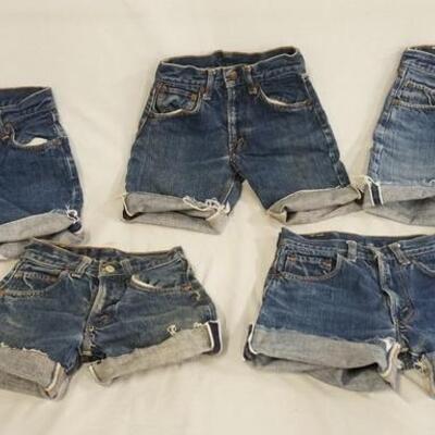 1078	LOT OF FIVE PAIRS OF LEVIS SELVEDGE JEANS THAT HAVE BEEN CUT INTO SHORTS ALL APPEAR TO BE YOUTH SIZES. VARYING DEGREES OF WEAR 
