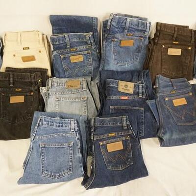 1035	LOT OF 14 PAIRS OF WRANGLER JEANS. VARYING DEGREES OF WARE 
