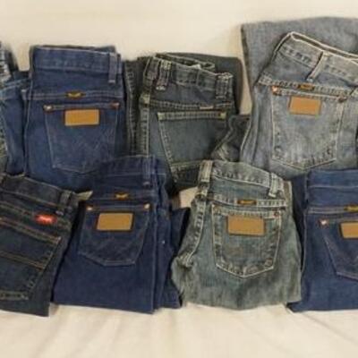 1037	LOT OF 14 PAIRS OF WRANGLER JEANS. VARYING DEGREES OF WARE 
