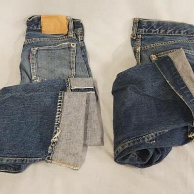 1044	LOT OF TWO PAIRS OF VINTAGE LEVI STRAUSS & COMPANY SELVEDGE JEANS. MEASURES APP. 23 X 24 & 28 X 24. VARYING DEGREES OF WEAR 

