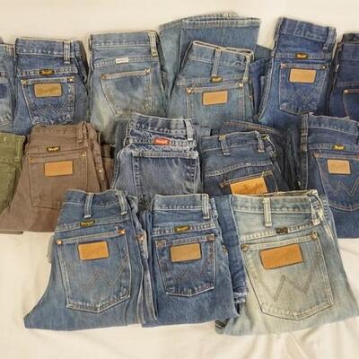1036	LOT OF 15 PAIRS OF WRANGLER JEANS. VARYING DEGREES OF WEAR 
