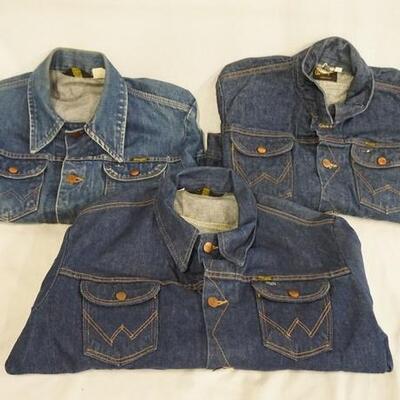 1034	LOT OF THREE VINTAGE WRANGLER DENIM JACKETS ALL ARE MARKED MADE IN USA ONE MISSING SIZE MEASURES APP. 19 IN SHOULDER TO SHOULDER,...