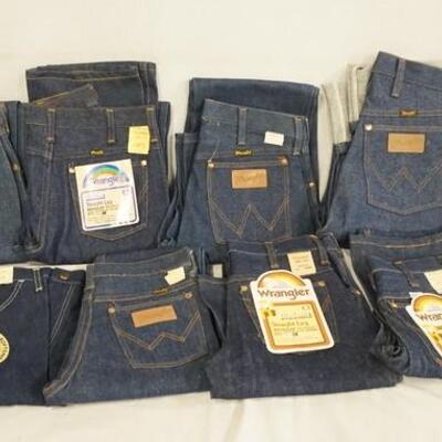 1053	LOT OF NINE PAIRS OF VINTAGE WANGLER JEANS NEW W/ TAGS. TWO ARE YOUTH SIZES 12 & 14, THE REST ARE SIZES 28 X 34, 27 X 32, 27 X 34,...
