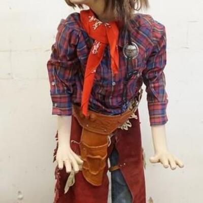 1050	BOY MANNEQUIN CLOTHED IN LEVIS JEANS, CHAPS & HOLSTER, PIERRE CARDIN SHIRT, BANDANNA, WIG & A FEATHERED HAT W/ A VINTAGE COCA COLA...